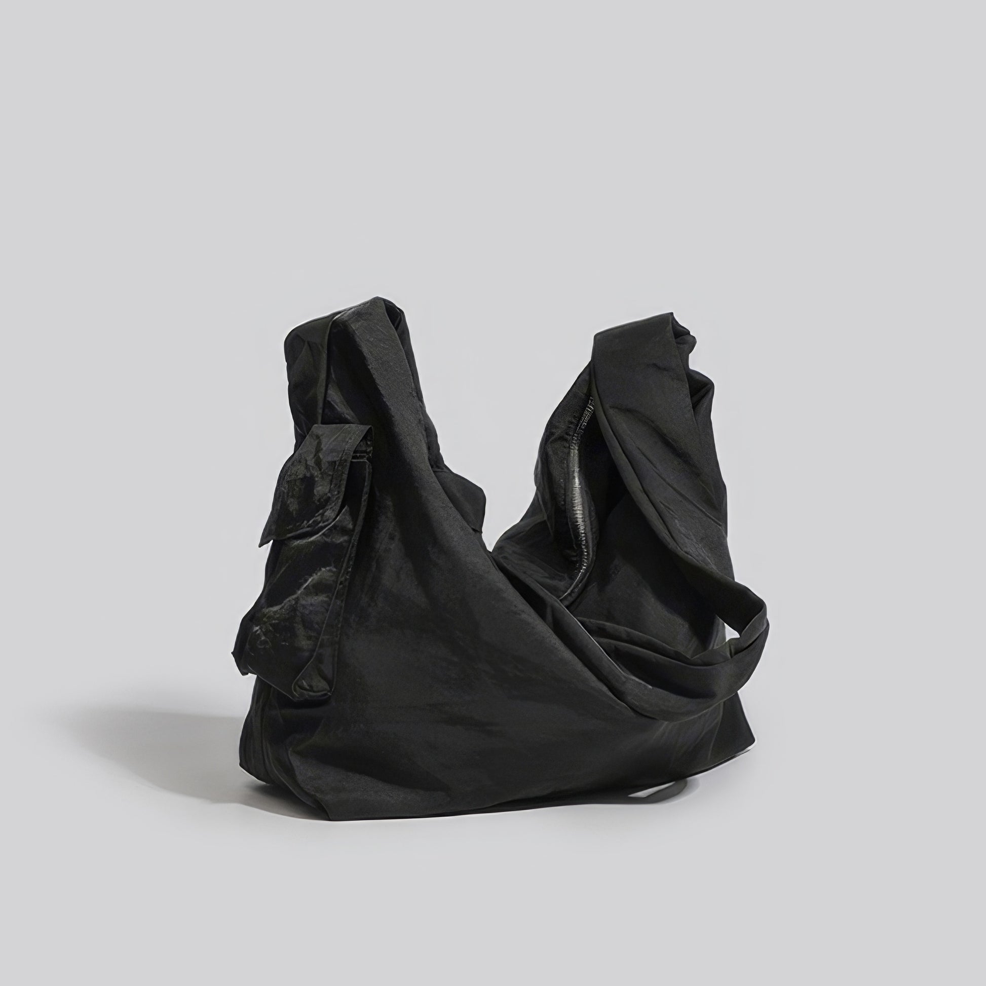 Twisted Strap Utility Pocket Shoulder Bag