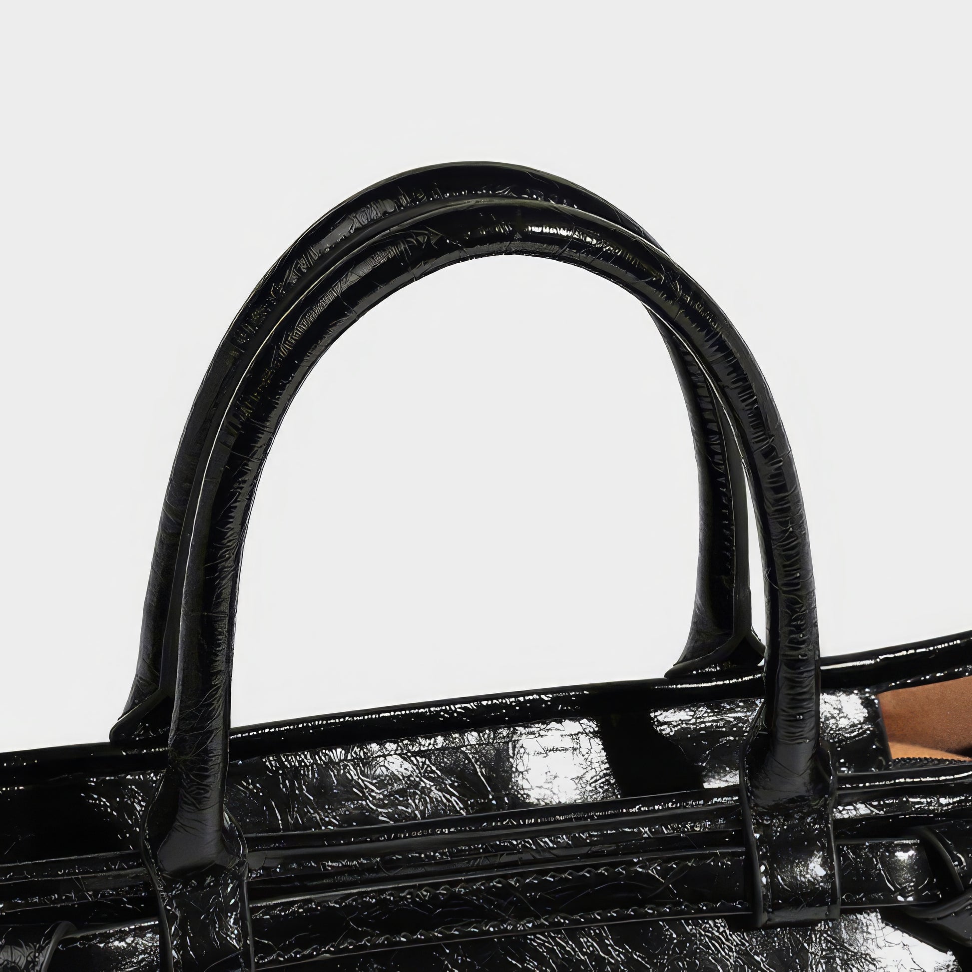 Glossy Barrel Buckle Handbag