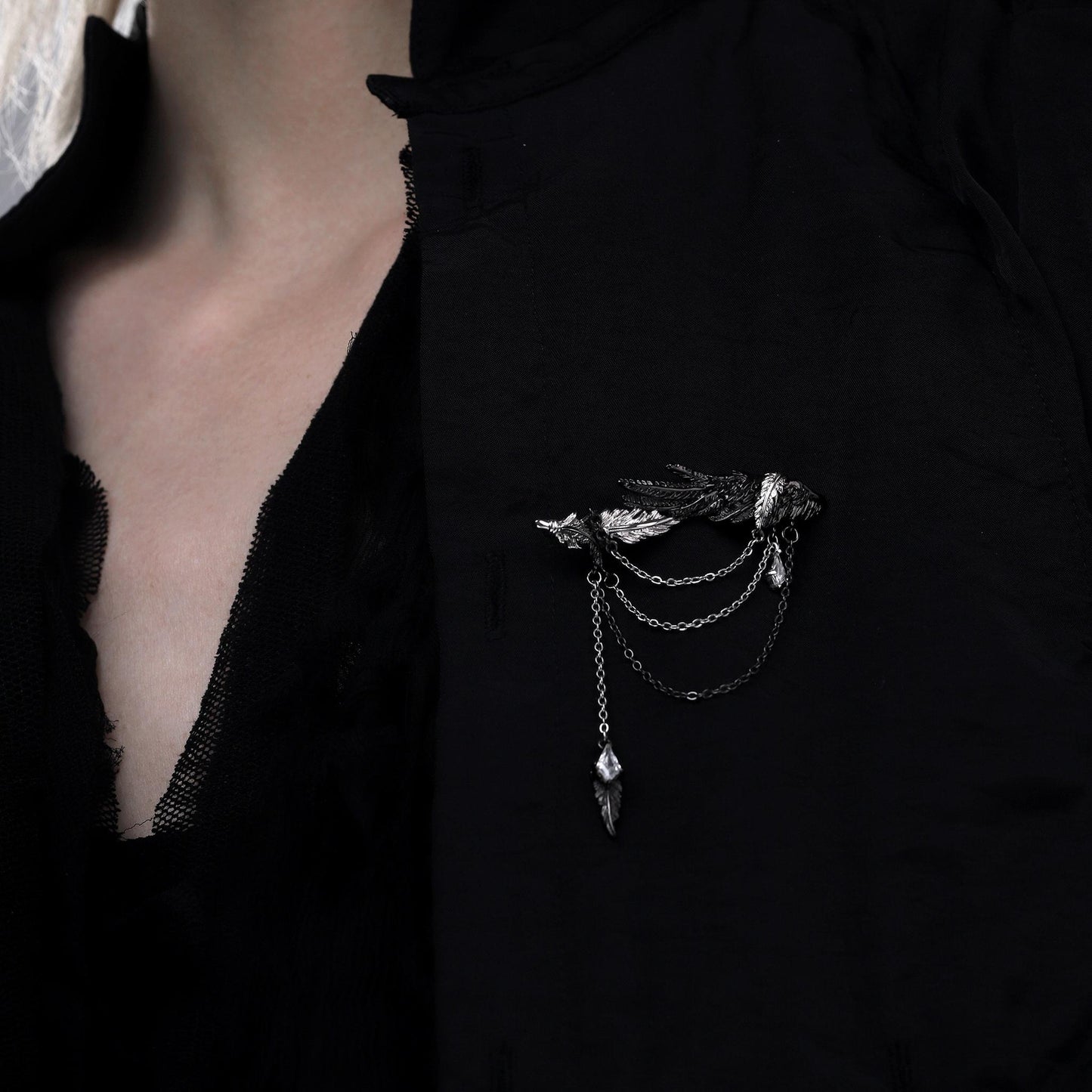 Feather Draped Dual-Tone Brooch