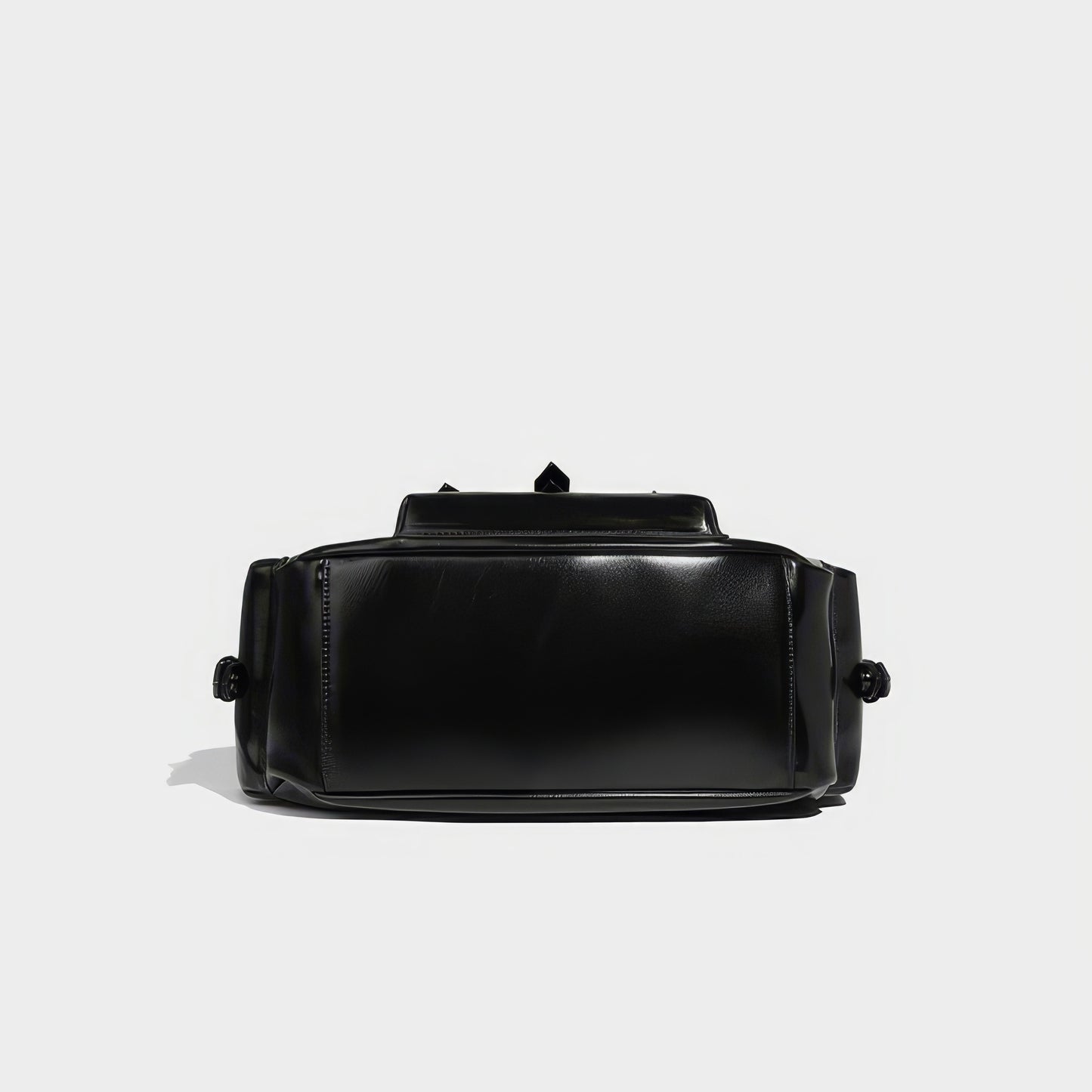 Triple Buckle Flap Barrel Bag