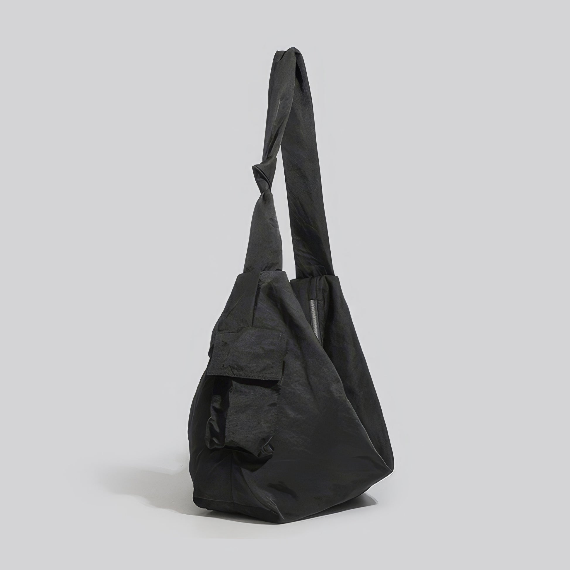 Twisted Strap Utility Pocket Shoulder Bag